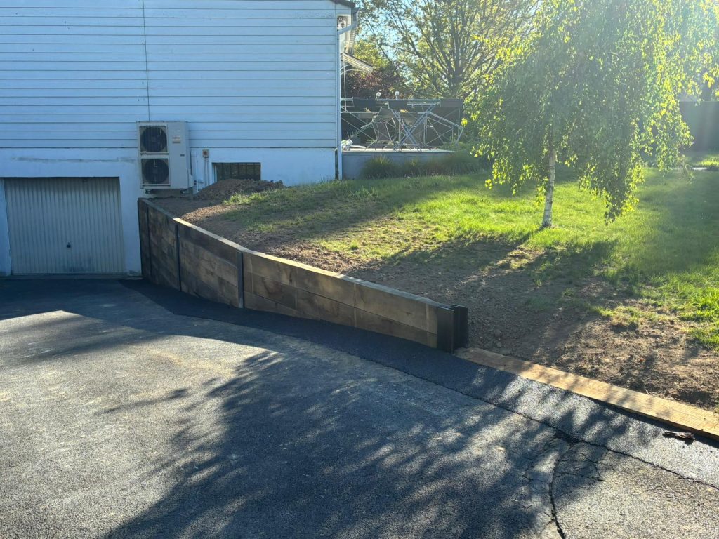 mur soutènement bois finition traverses paysagères Le Quesnoy aménagement extérieur